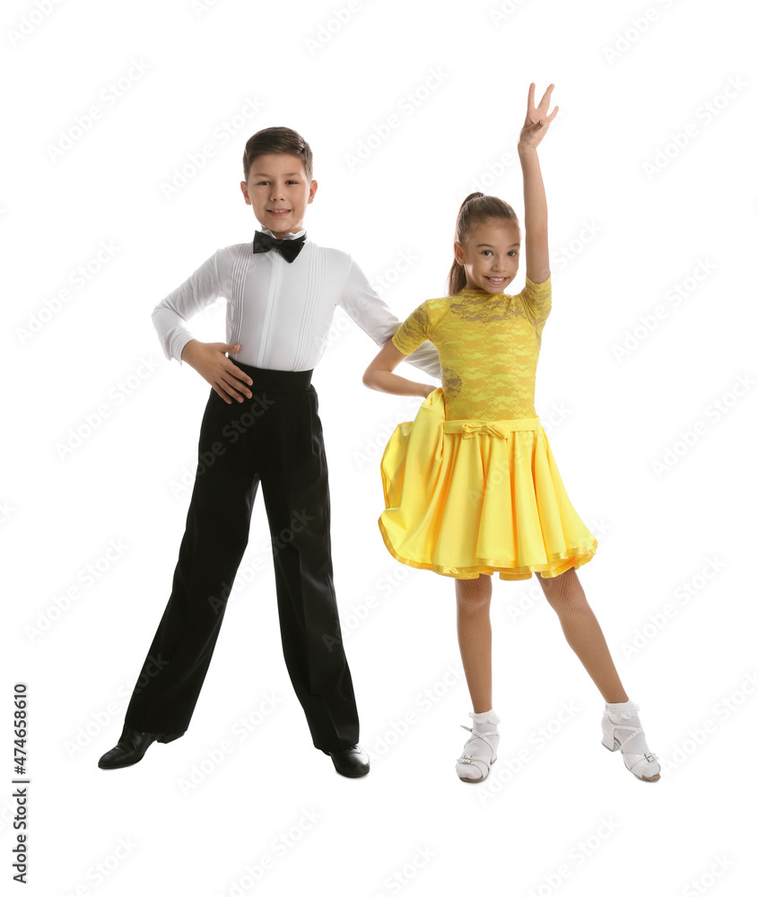 Beautifully dressed couple of kids dancing on white background Beautifully dressed couple of kids dancing on white background