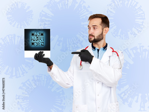 Doctor holding QR code. Cov...
