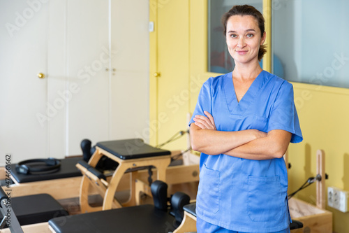 Принти на полотні Portrait of benevolent female healthcare professional in the recovery and pilate