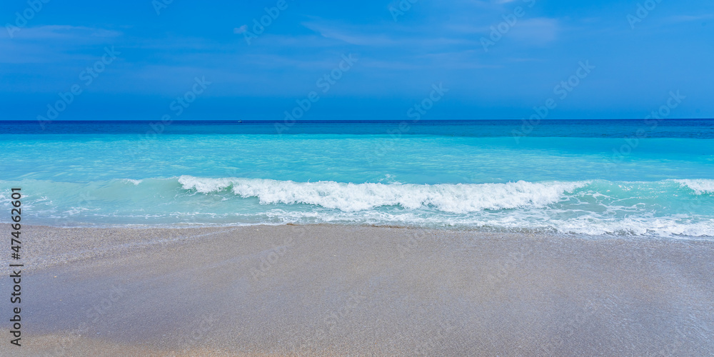 Runaway wave on the ocean coast in Florida in the spring. Turquoise ocean and perfect clear sand Melbourne Beach