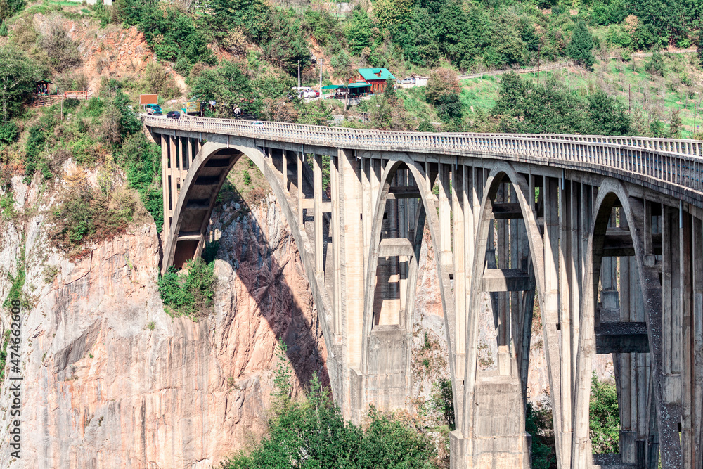 Bridge on Tara , popular attraction in Montenegro . Largest reinforced concrete road bridge in Europe