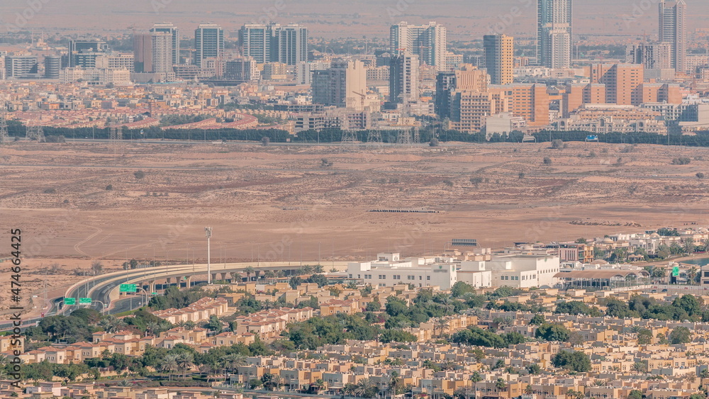 Fototapeta premium Aerial view of Jumeirah Village Circle district timelapse
