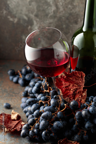 Red wine and blue grapes.