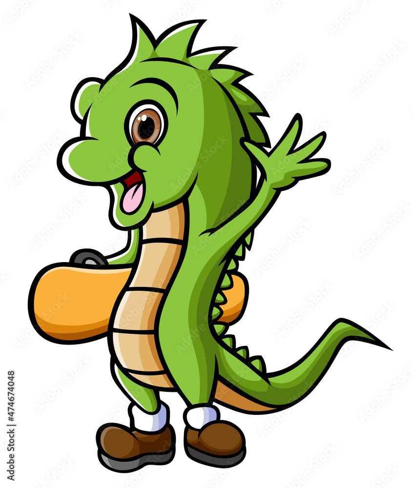 Fototapeta premium The cool iguana is playing the skateboard