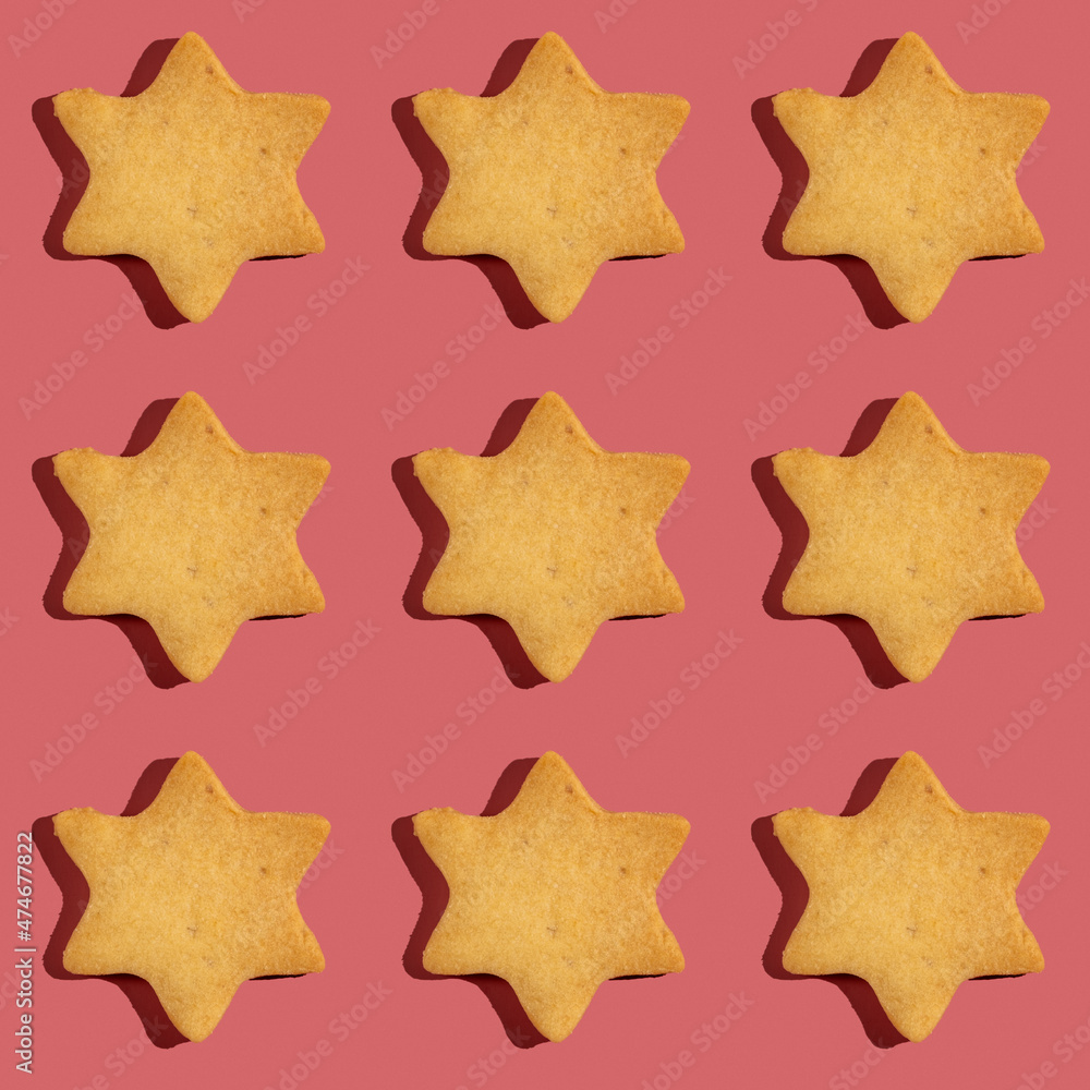 Seamless pattern with Hanukkah cookie on dark pink background. Seamless pattern with Hanukkah cookie on dark pink background.