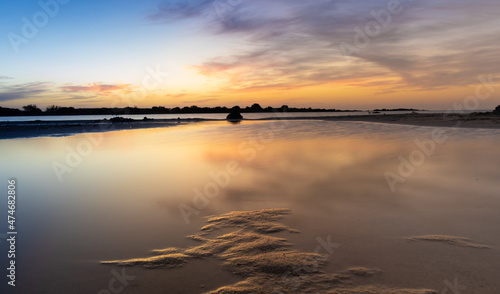 Stunning sunset over the shallow waters of the Elafonisi lagoon  deer island  on the southwest tip of Crete  Chania region  Greece.