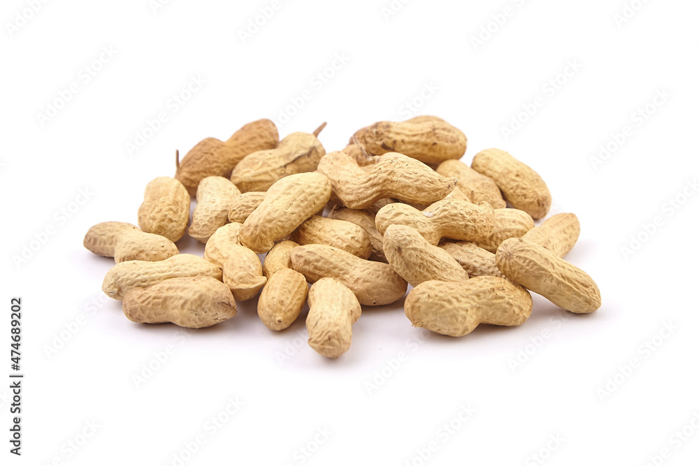 Roasted peanuts in shell isolated on white Roasted peanuts in shell isolated on white