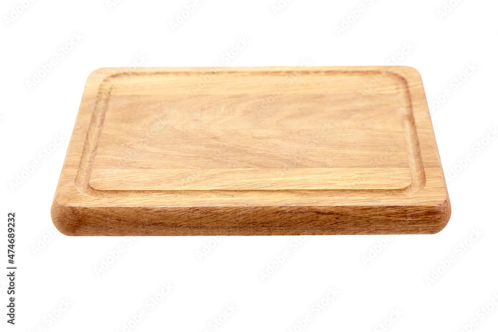 Wooden chopping or serving board with juice gutter isolated on white Wooden chopping or serving board with juice gutter isolated on white