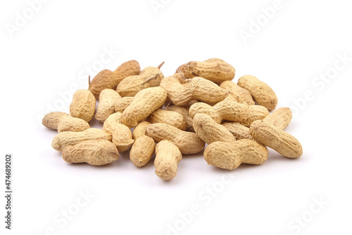 Roasted peanuts in shell isolated on white