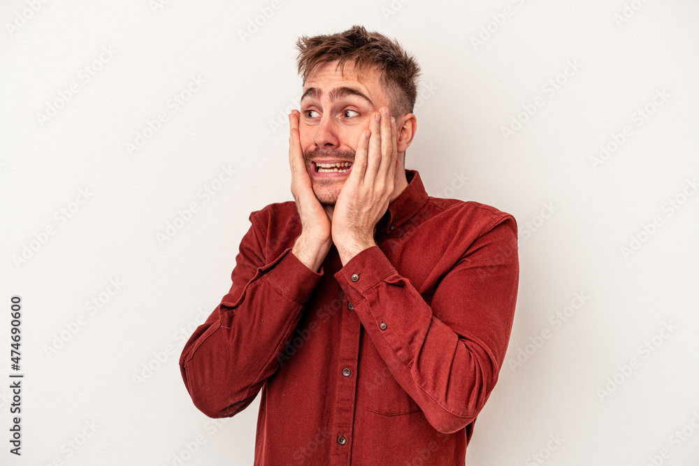 Young caucasian man isolated on white background who feels sad and pensive, looking at copy space. Young caucasian man isolated on white background who feels sad and pensive, looking at copy space.