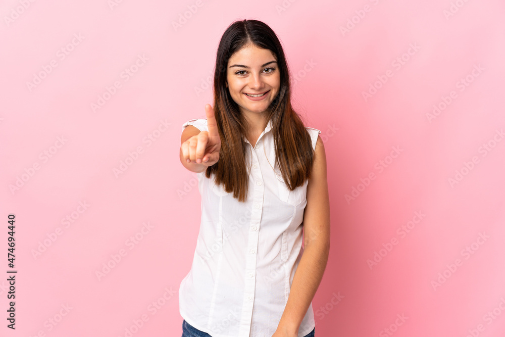 Young caucasian woman isolated on pink background showing and lifting a finger Young caucasian woman isolated on pink background showing and lifting a finger