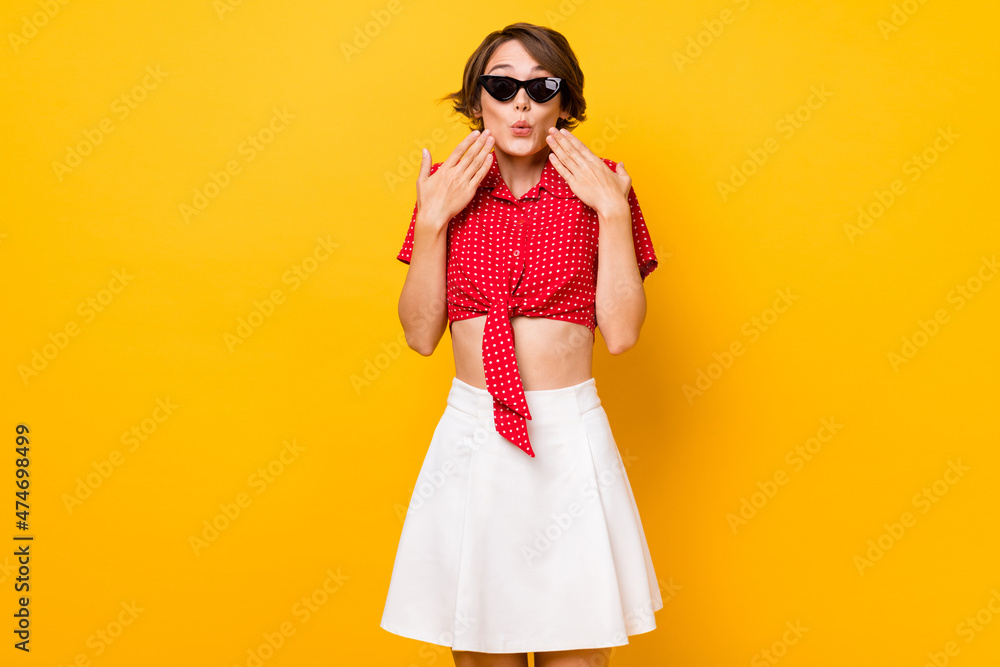 Portrait of impressed questioned lady arms palms near face cant believe isolated on yellow color background Portrait of impressed questioned lady arms palms near face cant believe isolated on yellow color background
