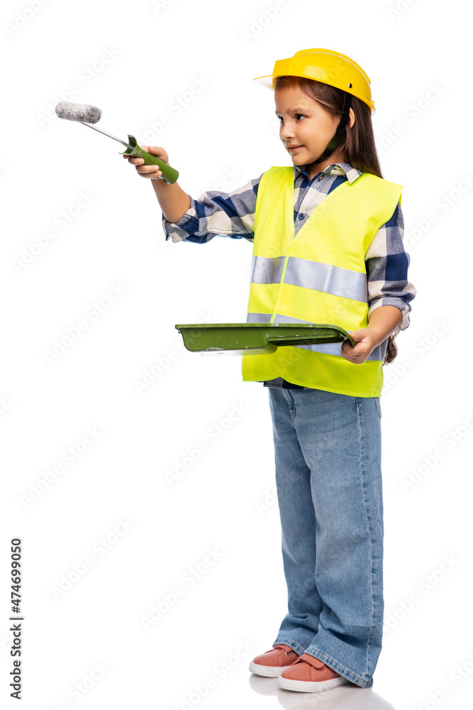 building, construction and profession concept - smiling little girl in protective helmet and safety vest with paint roller and tray painting something over white background building, construction and profession concept - smiling little girl in protective helmet and safety vest with paint roller and tray painting something over white background