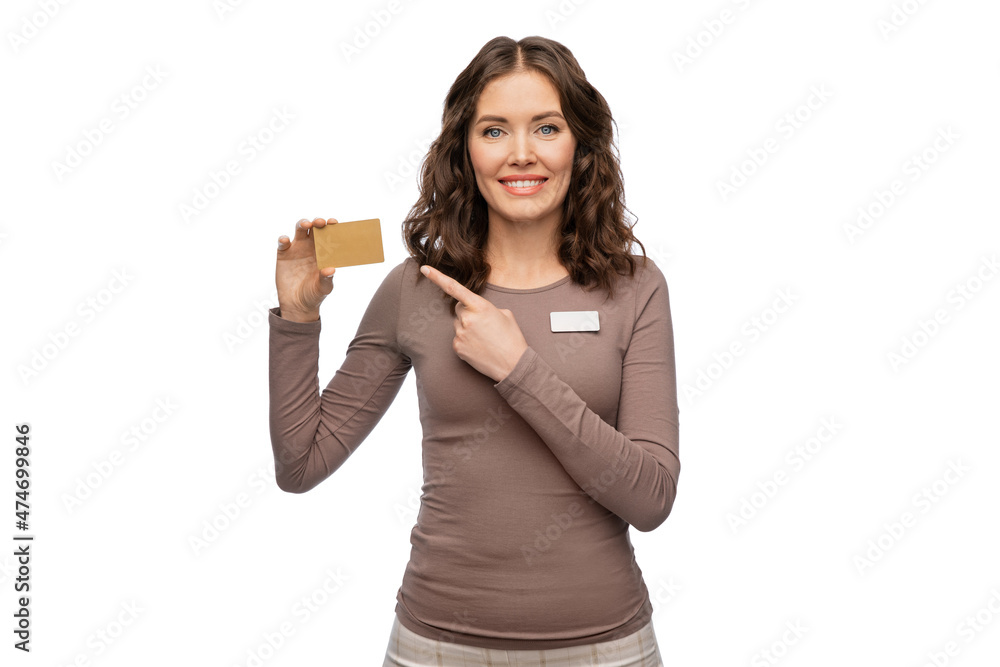 sale, shopping and business concept - happy female shop assistant holding golden credit card over white background sale, shopping and business concept - happy female shop assistant holding golden credit card over white background