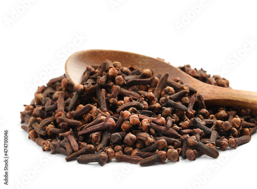 Wallpaper Mural Pile of aromatic dry cloves and wooden spoon on white background, closeup Torontodigital.ca