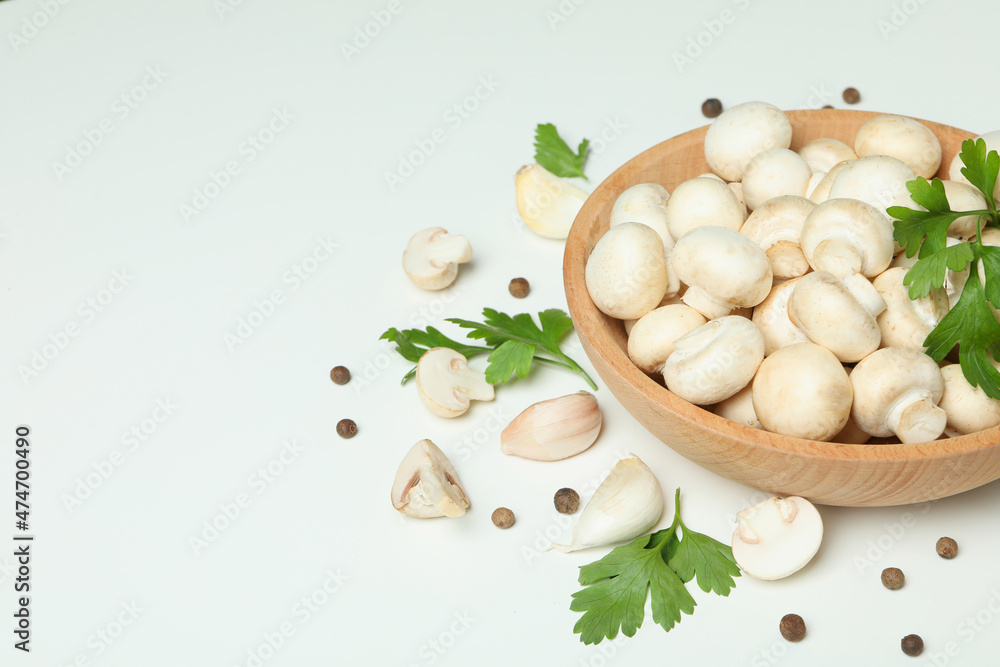 Concept of tasty food with champignon on white Concept of tasty food with champignon on white