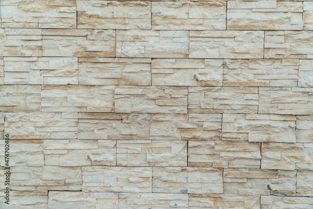Beige background made of artificial stone Beige background made of artificial stone