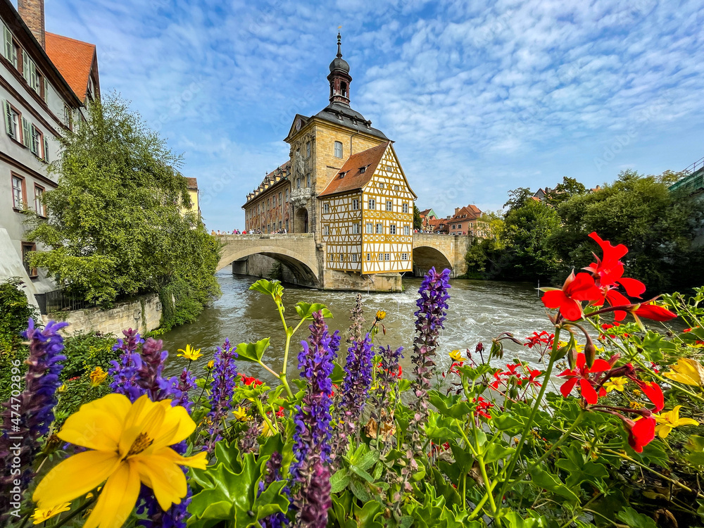 Old town hall in Bamberg with flowers in the foreground