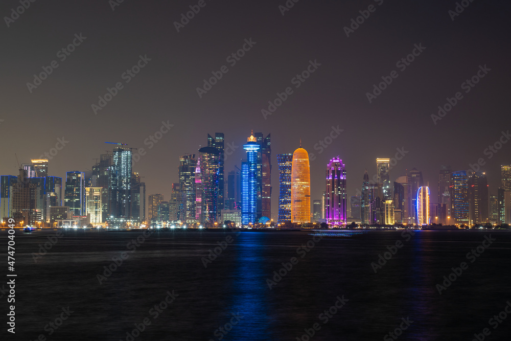 Fototapeta premium Doha city skyline illuminated at night. Qatar, Middle East