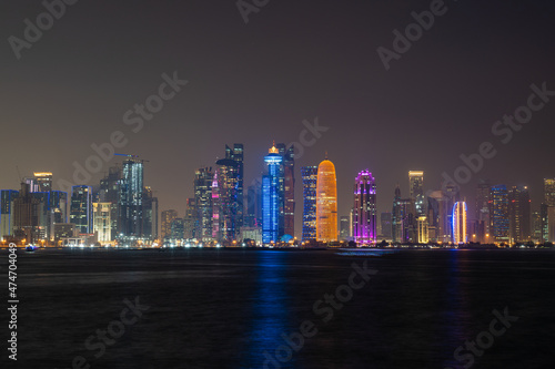 Doha city skyline illuminated at night. Qatar, Middle East
