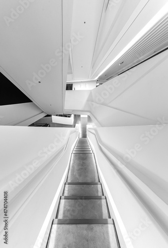 Interior view of empty futuristic stairway. Modern building abstract background