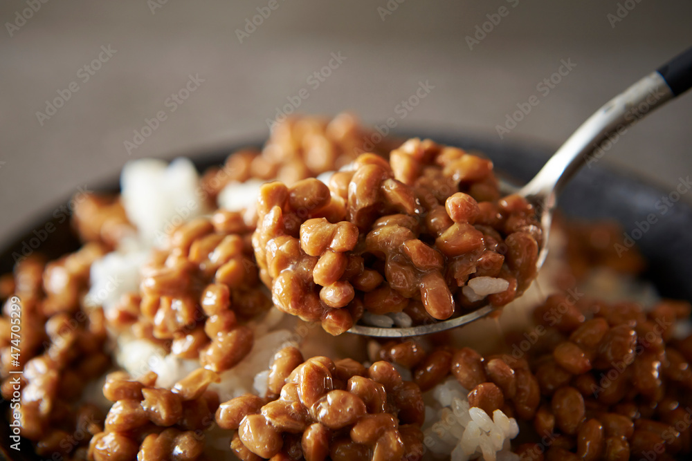 Obraz premium Close-up of natto on white rice