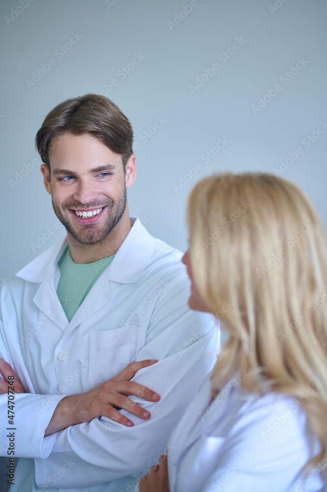 Man and woman communicating in good mood Man and woman communicating in good mood