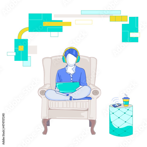 A girl plays mobile games in an armchair