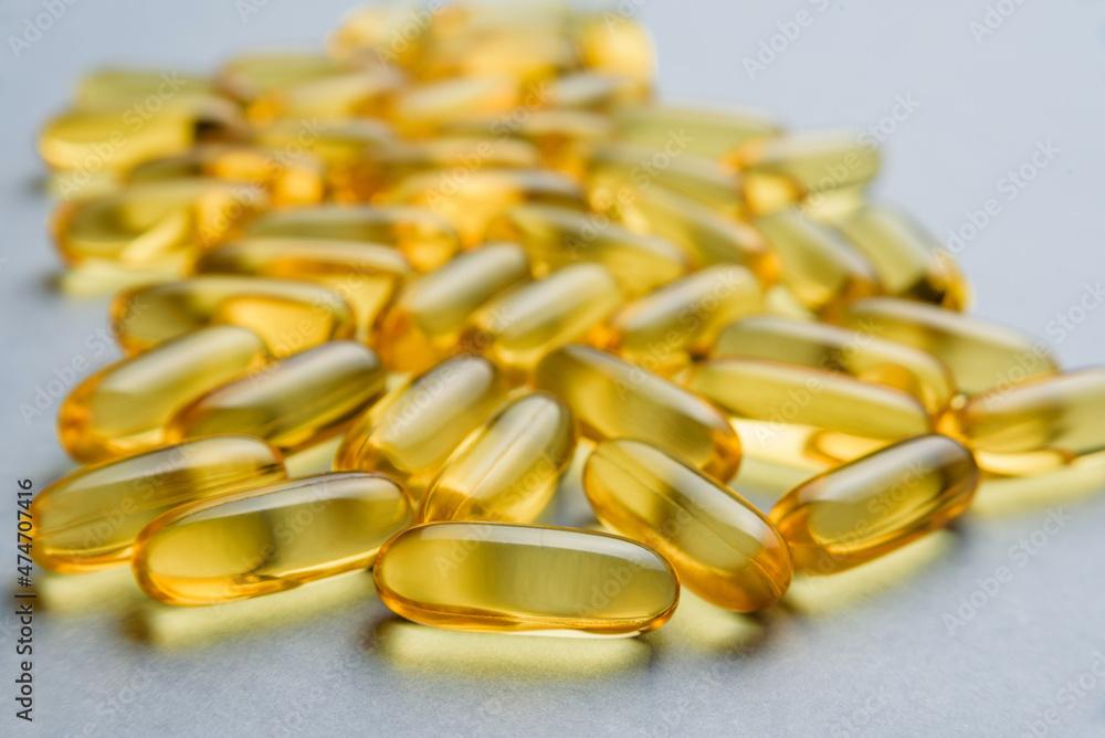 Close-up omega-3 capsules with selective focus. Close-up omega-3 capsules with selective focus.