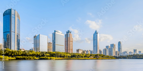 Sunny scenery of Wanlv Park and International Trade CBD buildings in Haikou, Hainan, China photo