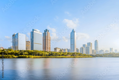 Sunny scenery of Wanlv Park and International Trade CBD buildings in Haikou, Hainan, China photo