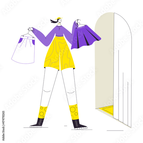 A girl waits in line for a dressing room in a store