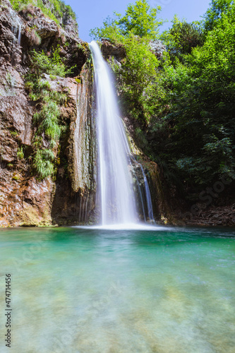 the Ampola waterfall, in Val di Ledro, near the town of Storo, Trentino, Italy - August 2021.