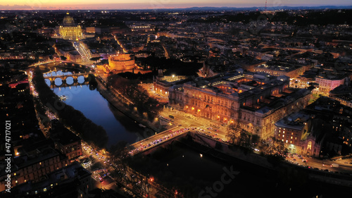 Aerial drone night shot from illuminated Cassation court Palace of justice, the highest supreme court of Italy next to famous piazza Cavour, Rome historic centre © aerial-drone