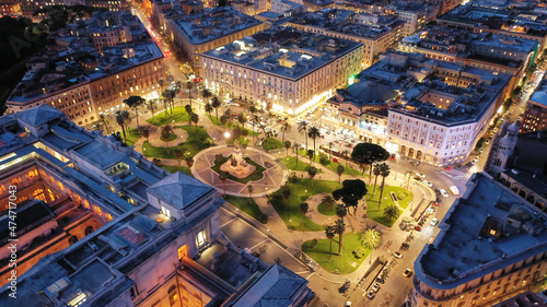 Aerial drone night shot from illuminated Cassation court Palace of justice, the highest supreme court of Italy next to famous piazza Cavour, Rome historic centre