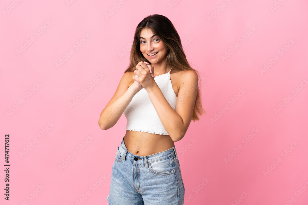 Young caucasian woman isolated on pink background laughing Young caucasian woman isolated on pink background laughing