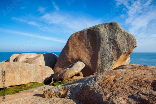 Big stones on the pink Granite Coast, Ploumanach, France photo