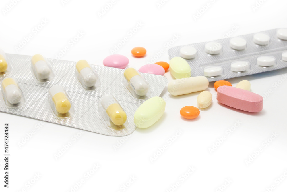 Medical / health-care concept: Colorful isolated pills