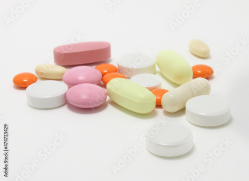 Foto Medical / health-care concept: Colorful isolated pills