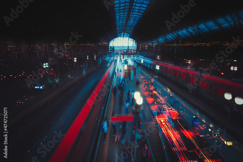 Abstract city night blurred light double exposure moving train and people background. Concept image.