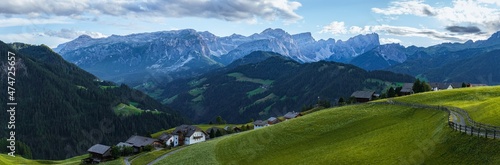 The mountains and woods of Val Badia, seen from the village of "La valle", Italian Dolomites - August 2021.