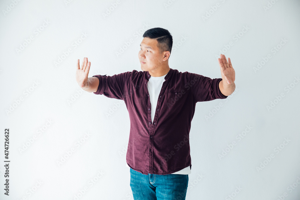 portrait of a male Asian dancer in a white hall portrait of a male Asian dancer in a white hall
