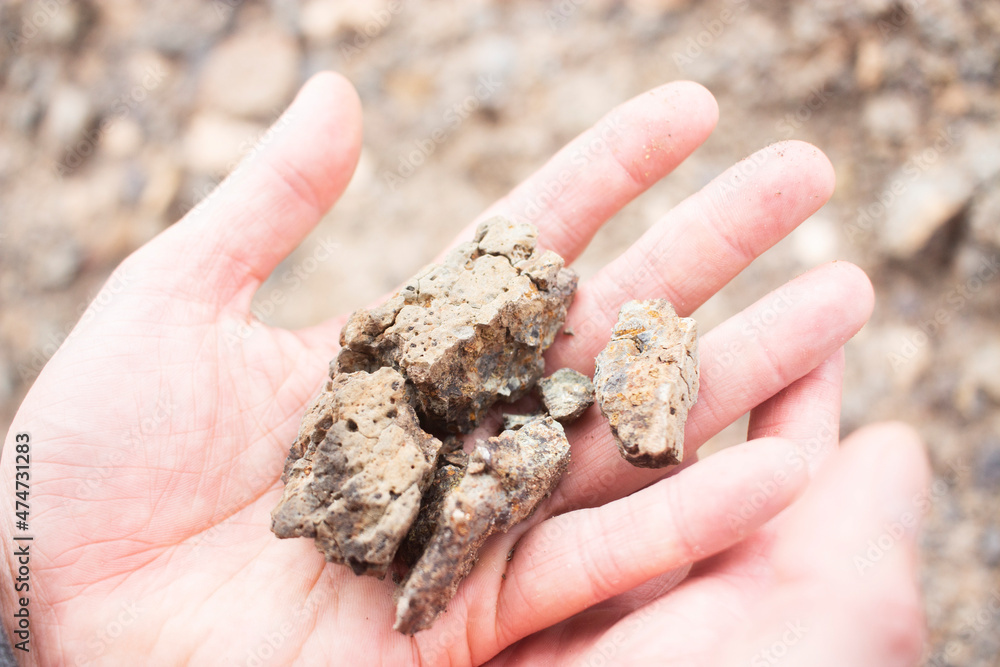 Hands holding rocks Hands holding rocks