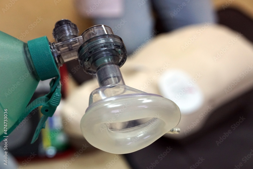 Using a Breathing bag (Ambu) by a student on a simulation dummy during basic life support with