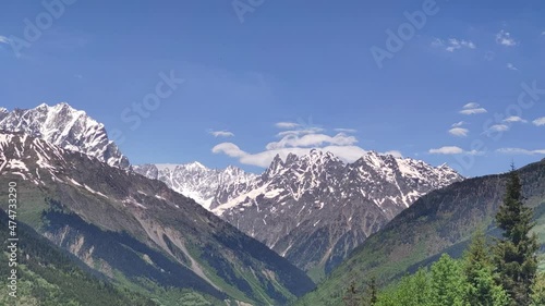 Mt. Ushba double peaks in the summertime.  Time-lapse