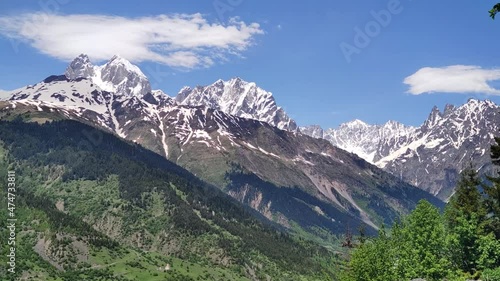 Landscape with the sky. Double peak mountain Ushba. 1:26 - raw footage for time lapse 