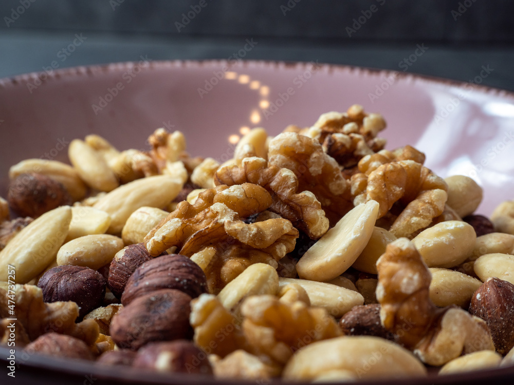 Mix nuts on a wooden background. Mix nuts on a wooden background.
