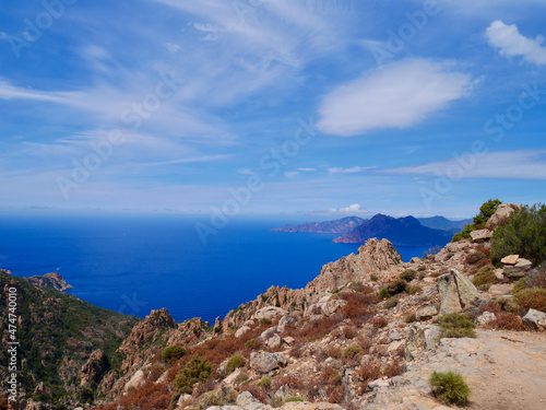 Red cliffs of the Calanche, UNESCO world heritage, and the Golf of Porto. Corsica, France.