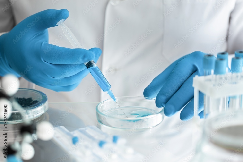 Health care researchers working in life science laboratory, work for test a vaccine Health care researchers working in life science laboratory, work for test a vaccine