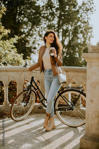 Young woman with mobile pho...